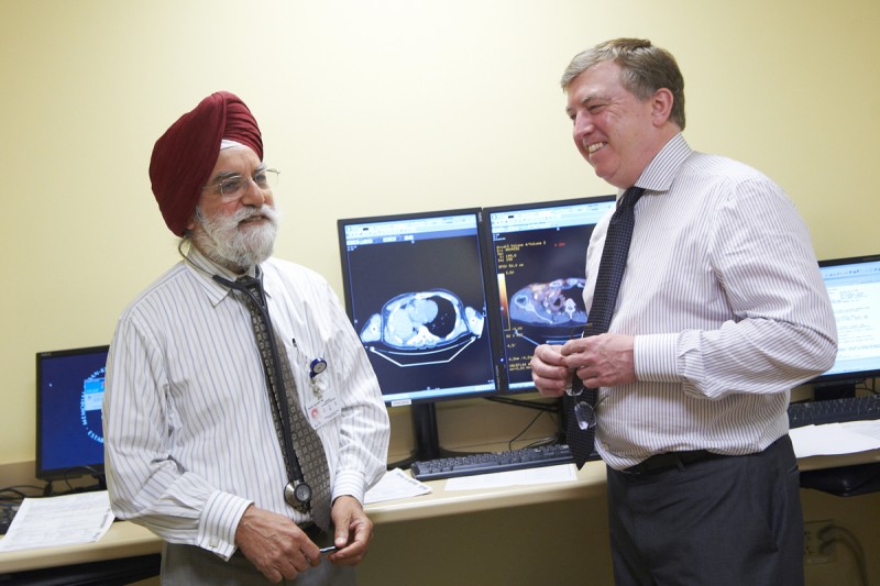 Pictured: Manjit Bains and Robert Downey