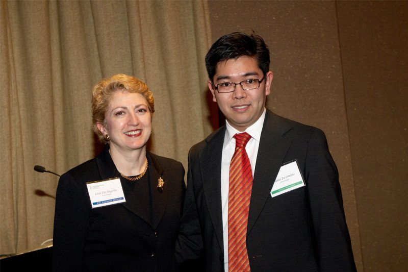 Lisa DeAngelis, BTC Executive Director; and Fabio Iwamoto, Poster Winner, Neurology Fellow