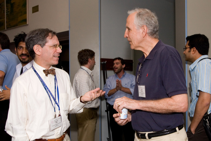 Memorial Sloan-Kettering Clinical Genetics Service Chief Kenneth Offit (left) talks with Peter Besmer, a member of Sloan-Kettering Institute's Developmental Biology Program
