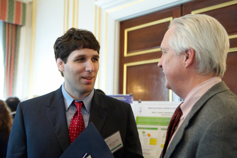 Nicholas Szerlip, Poster Presenter, and Eric Holland, BTC Director