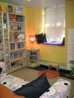 Cozy reading nook offers award-winning books in new, handmade bookcases