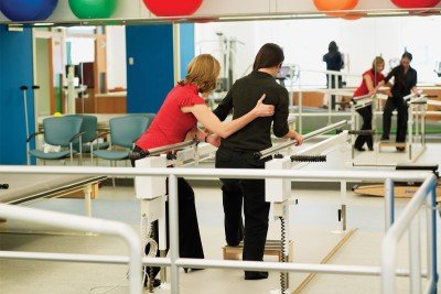 Physical therapist with patient