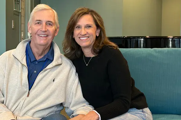 MSK treated Steve Harrold, sitting with his wife, Sara, for throat cancer. 
