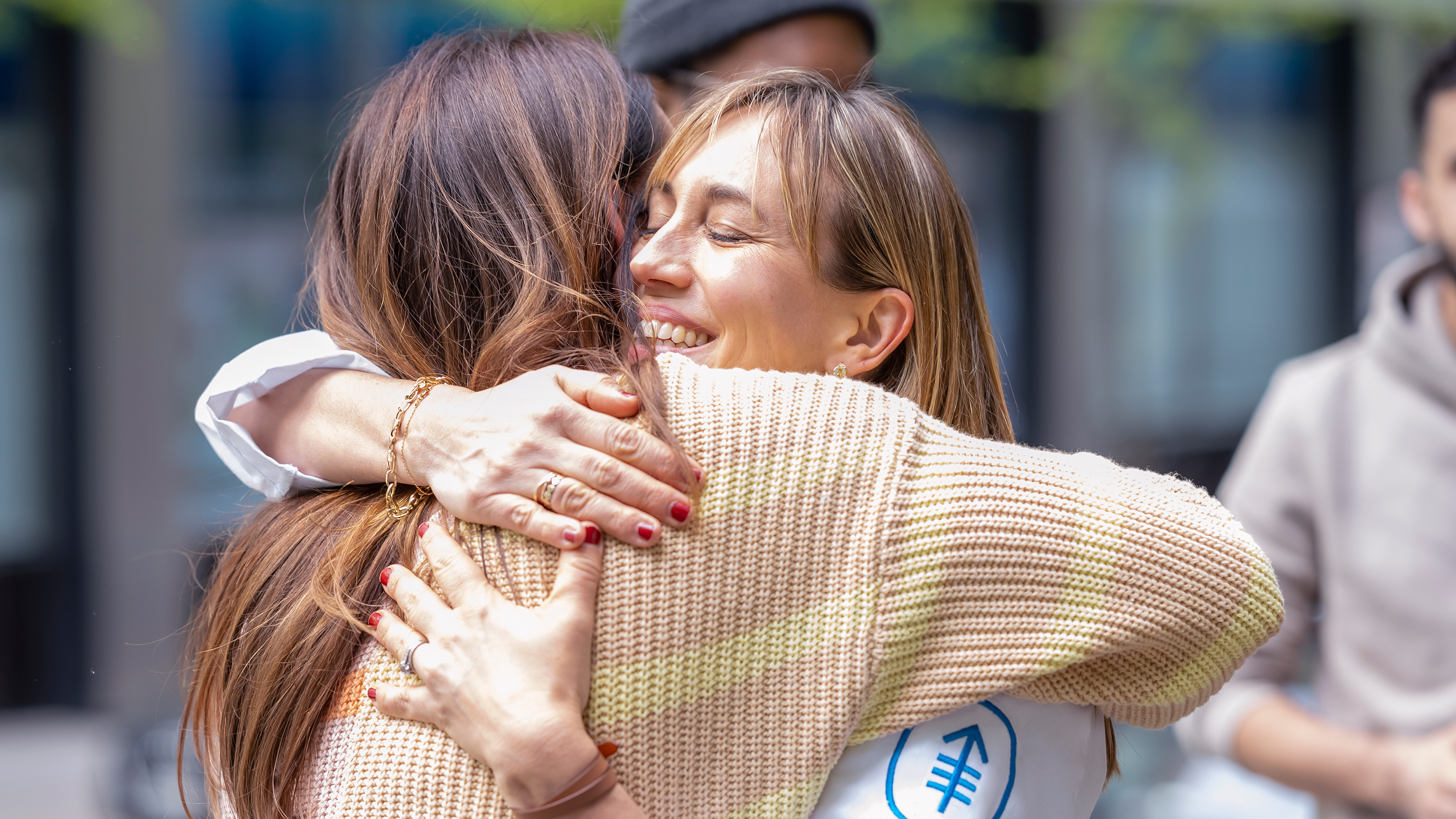 Dr. Andrea Cercek hugs a patient who was treated for rectal cancer in an MSK clinical trial.