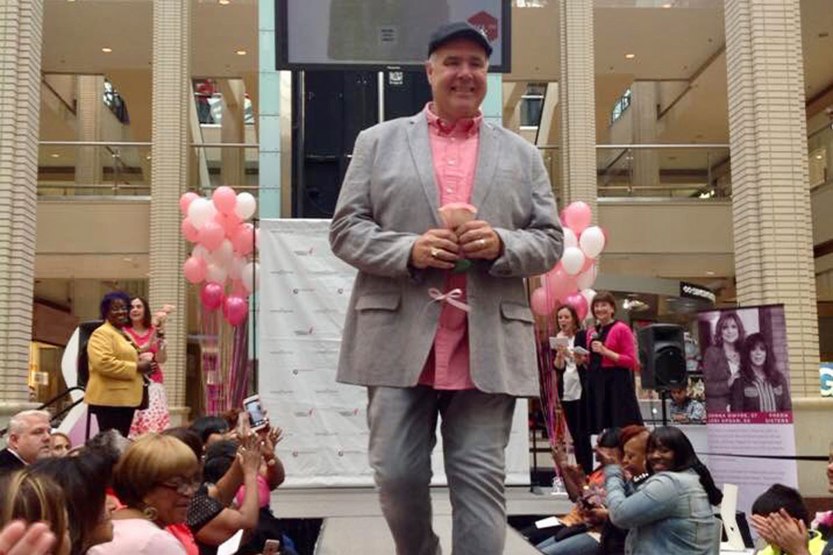 Jim participated in a fashion show for breast cancer awareness.