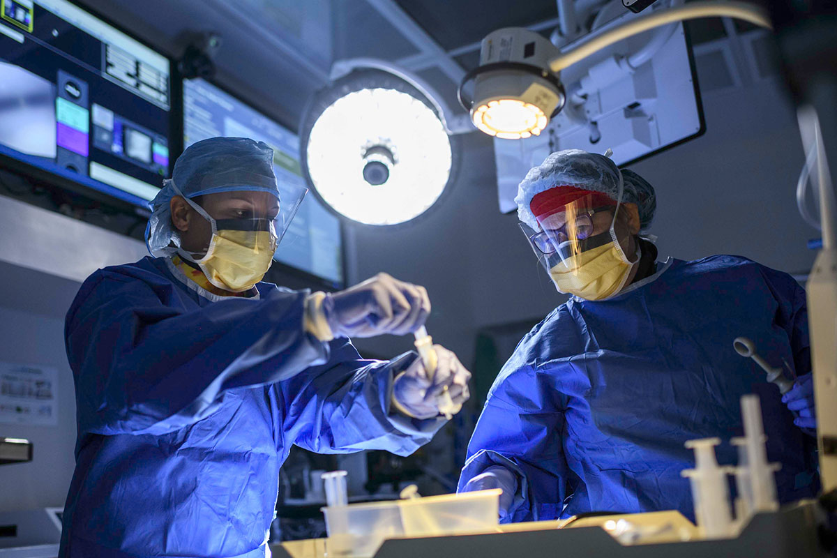 Dr. Husta and Dr. Bott in surgery