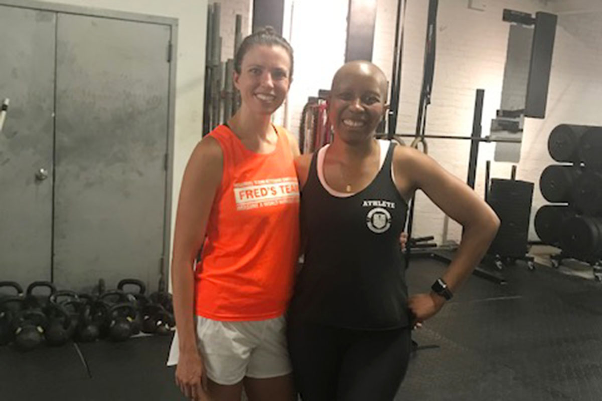 MSK patient Theresa Langley in a gym with MSK nurse Ashley Pildis, who helped care for Theresa during treatment. 