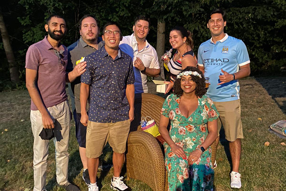Chris (third from left) and friends from college at a baby shower.