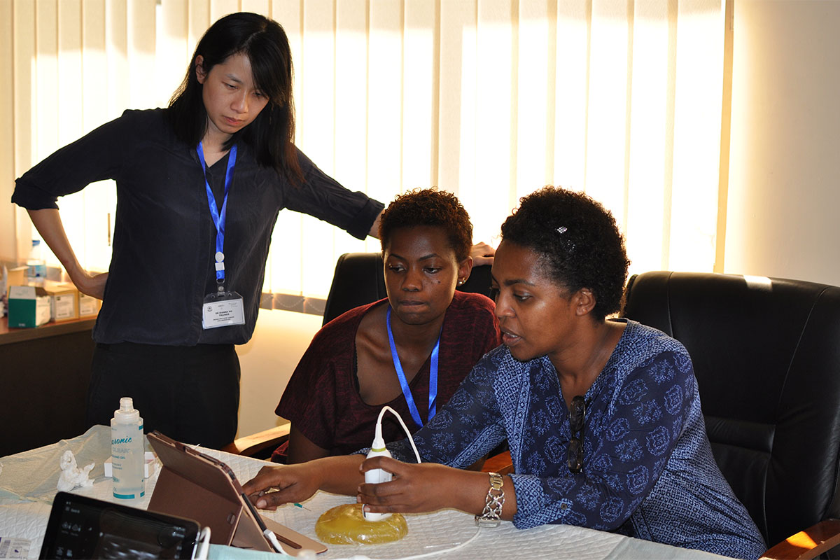 Drs. Dianna Ng, Eva Mbwilo, and Asteria Kimambo at an ultrasound guided fine needle aspiration biopsy workshop in Tanzania