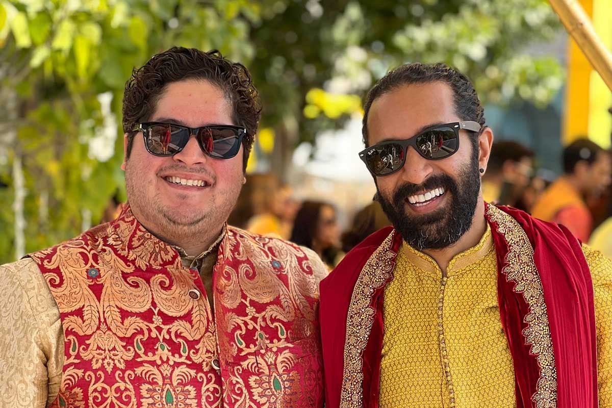 Bharat (right) and his partner, Gregory, attend a wedding in India
