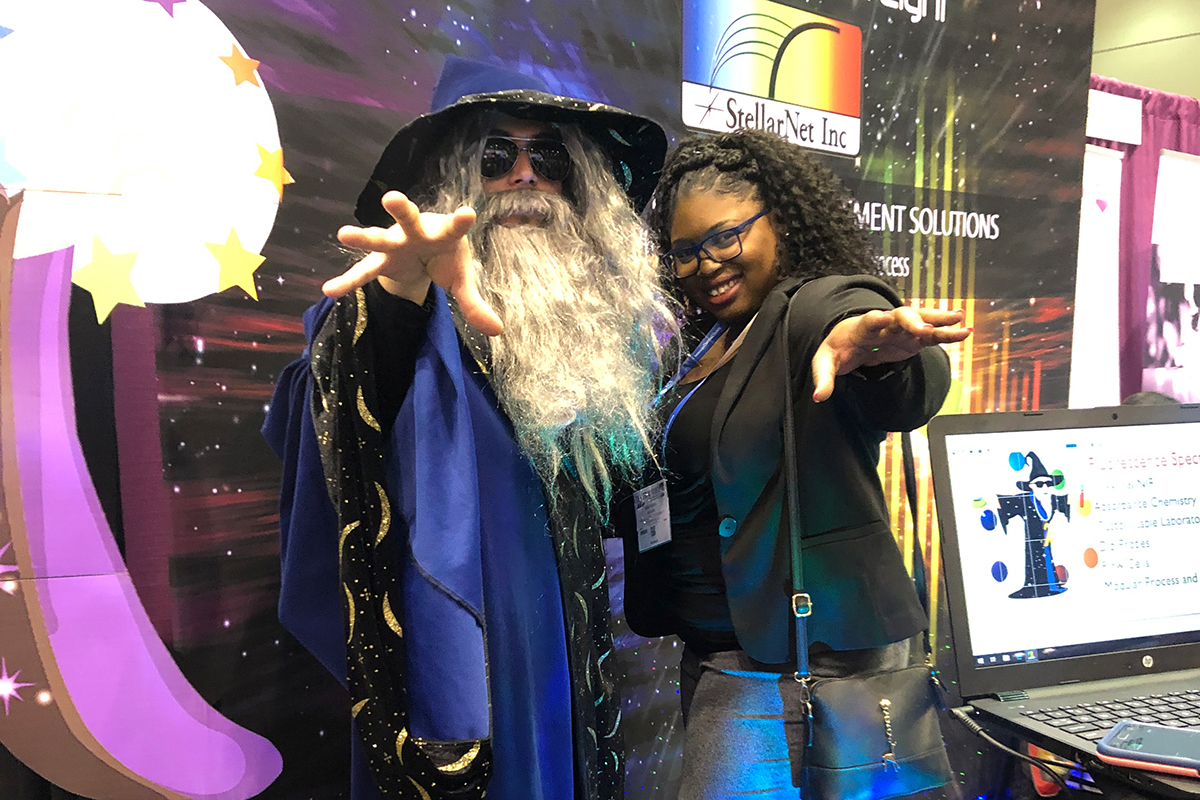 Shaniqua Hayes with the StellarNet wizard at the 2019 American Chemical Society meeting
