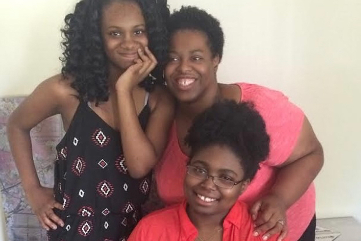 Shaniqua Hayes in her grad school apartment in Baton Rouge, with her sister and mother