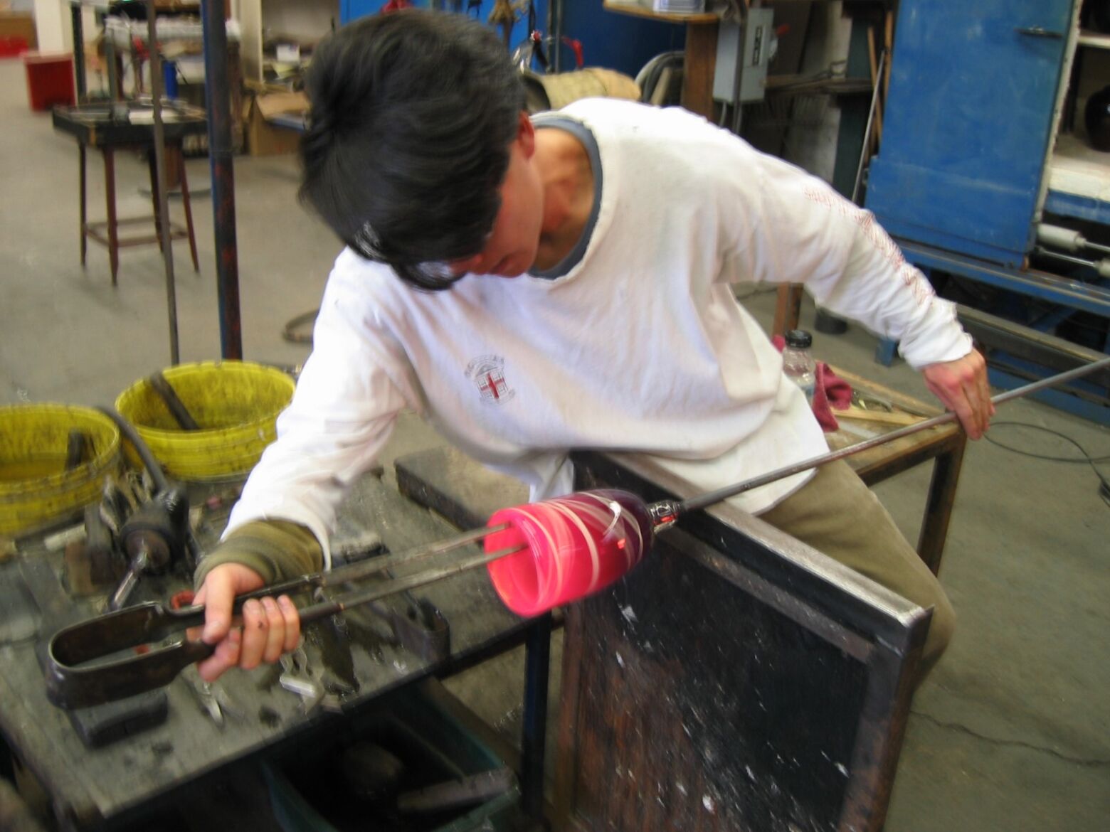 Eric Lai blowing glass