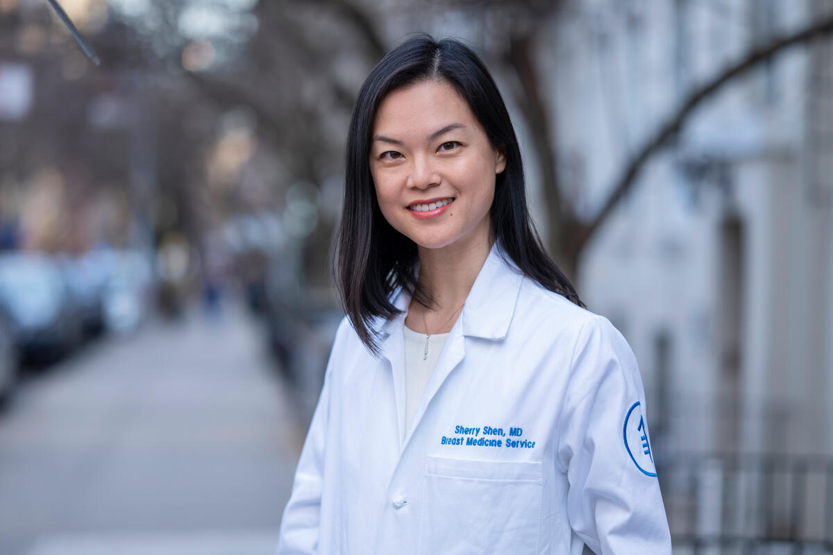 Breast medical oncologist Sherry Shen seen smiling outdoors. 