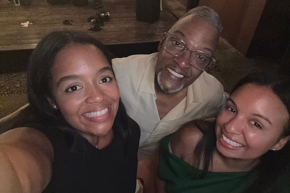 Patient Carlos Veras with his two daughters