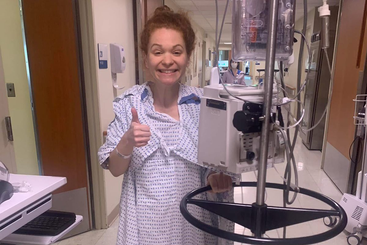 Dr. Teichholtz gives a thumbs-up in the hallway at MSK