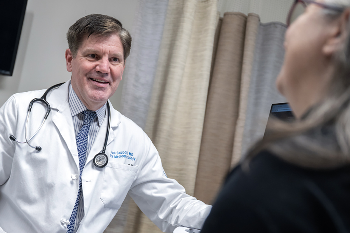 Dr. Paul Sabbatini seen with patient.