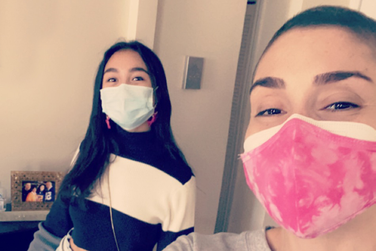 Mable and Sarah in the hospital wearing medical masks
