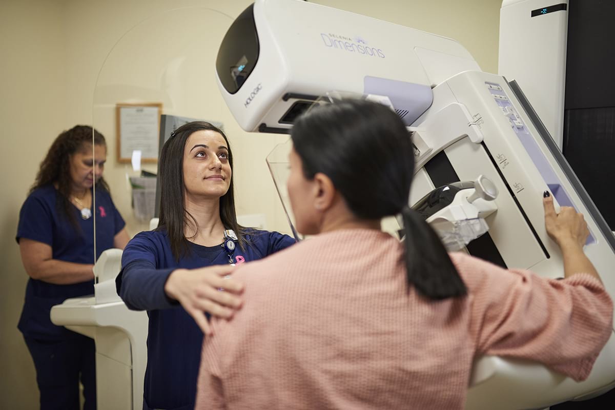 Woman receiving a mammogram