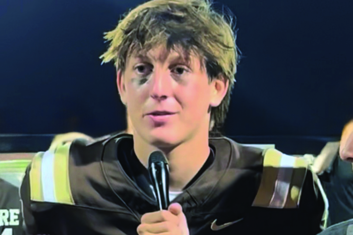 As the quarter back of his high school football team, Tommy is interviewed after a game