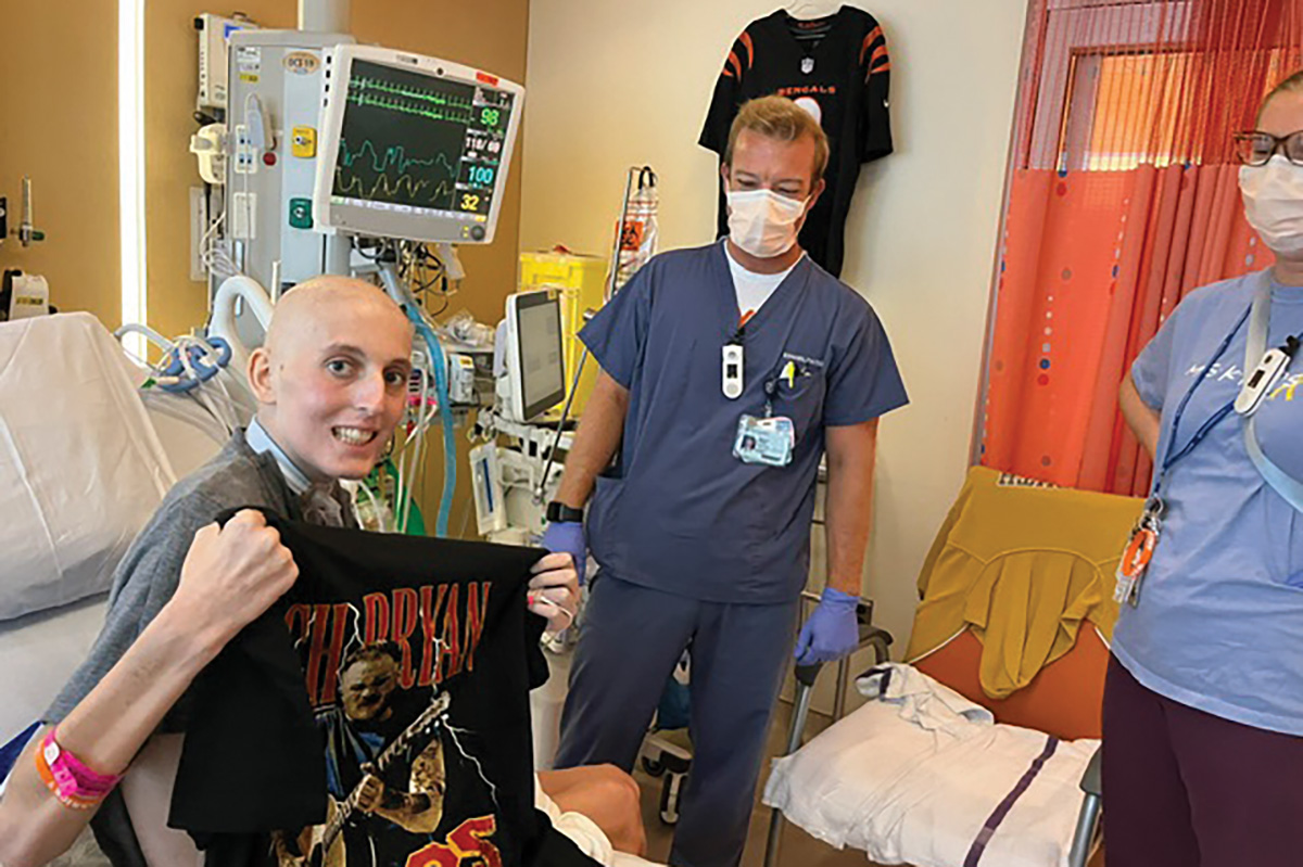 Tommy Ryan poses with a concert T-shirt, a gift from his PTs