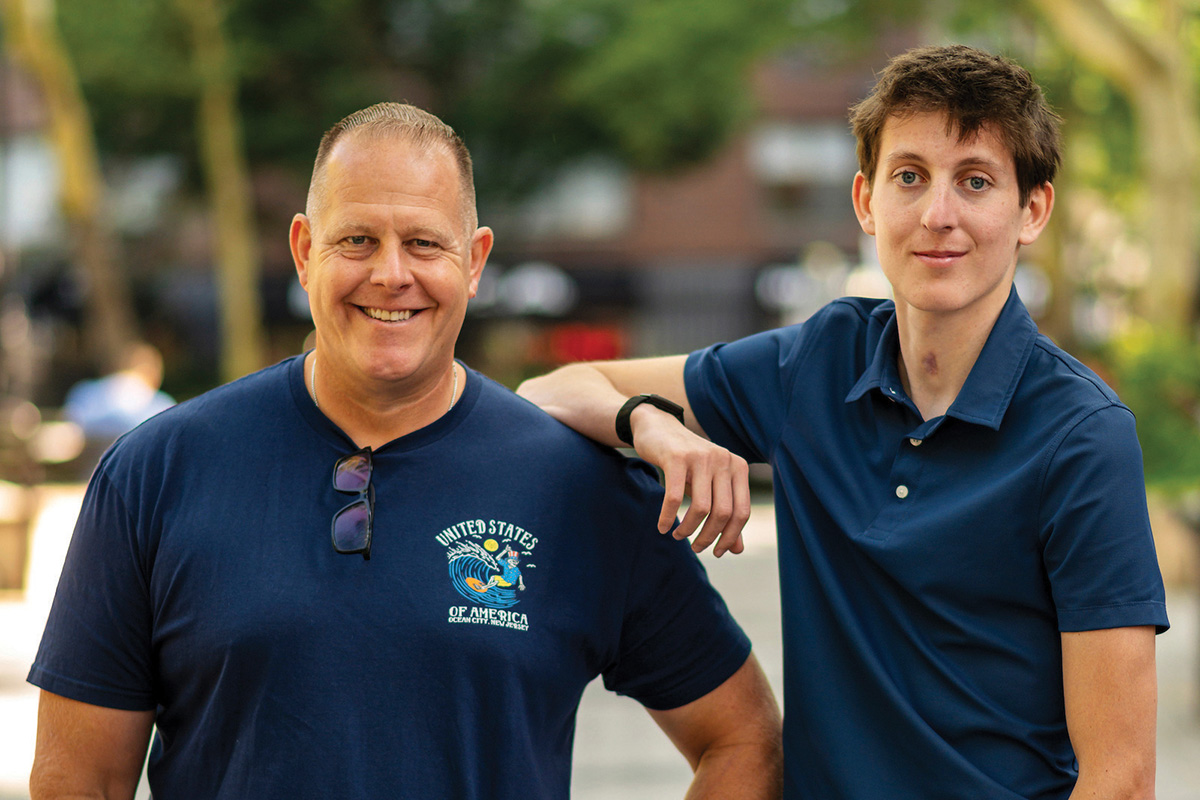 Tommy Ryan and his father, Dan, in a park near MSK Kids 