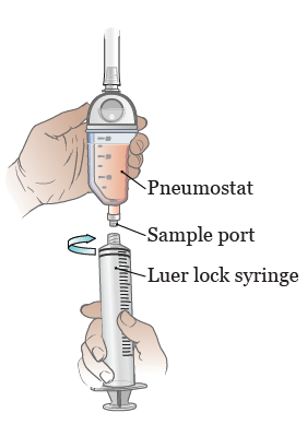 Figure 6. Twisting the syringe onto the port