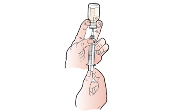 Figure 10. Pulling back plunger to fill the&nbsp;syringe with medication