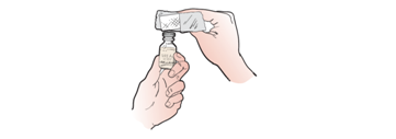 Figure 4. Cleaning the top of the medication bottle with an alcohol wipe