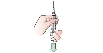 Figure 8. Pulling back the syringe to prescribed dose of medication