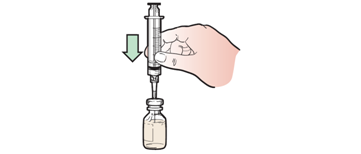 Figure 9. Pushing syringe into the medication vial