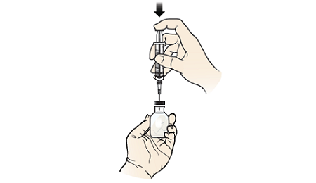 Figure 3. Injecting the diluting solution into the glucagon vial