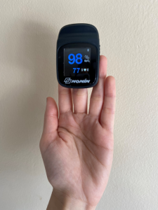 Figure 8. Pulse oximeter on any of your 3 middle fingers
