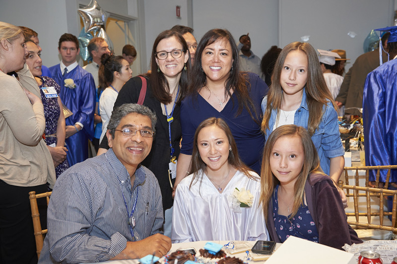 Graduate Brittany Zaita and her family with pediatric oncologist Shakeel Modak (bottom left) and psychiatrist Julia Kearney (top left)