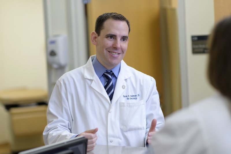 MSK medical oncologist and testicular cancer expert Darren Feldman speaks to a colleague.