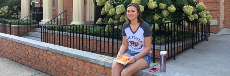 Memorial Sloan Kettering osteosarcoma patient Grace Franzese outside her dorm at Wake Forest University in North Carolina.