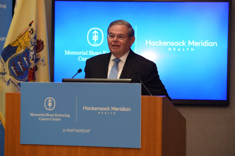 Executives at Memorial Sloan Kettering and Hackensack Meridian Health announce a partnership at a press conference