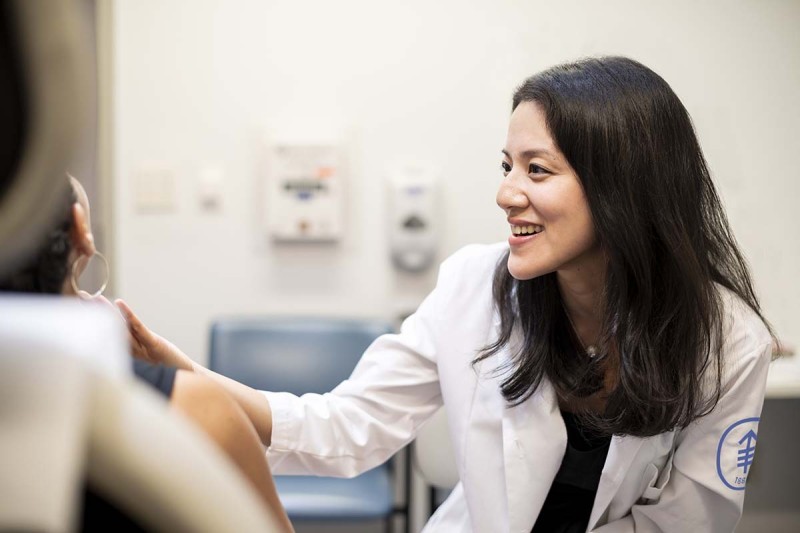 Mohs surgeon Erica Lee with a patient