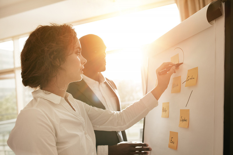 Woman giving presentation at work