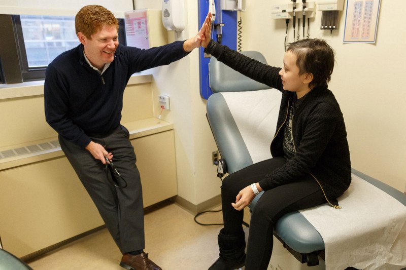 Pediatric oncologist Kevin Curran with CAR T patient Esmeralda Pineda