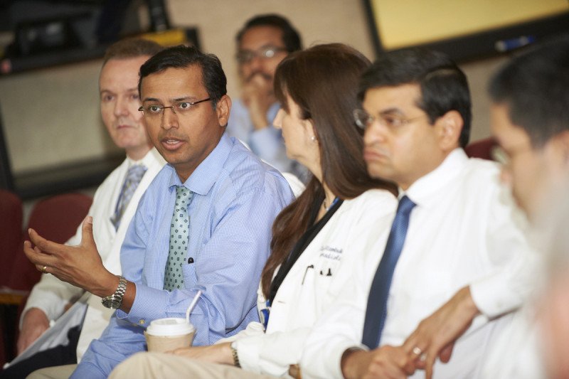 Head and Neck Surgeon Bhuvanesh Singh presents a patient's case study to fellow MSK team members.