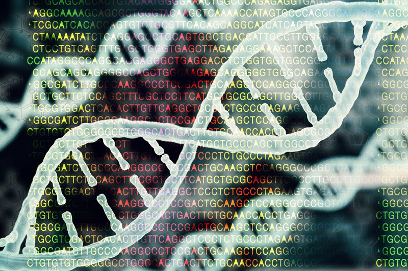 Image of DNA helix with sequence in the background