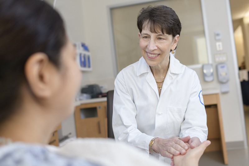 Judith Nelson with a patient