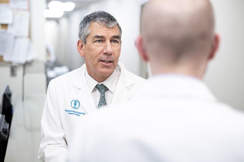 Urology Service Chief James Eastham talks to a patient