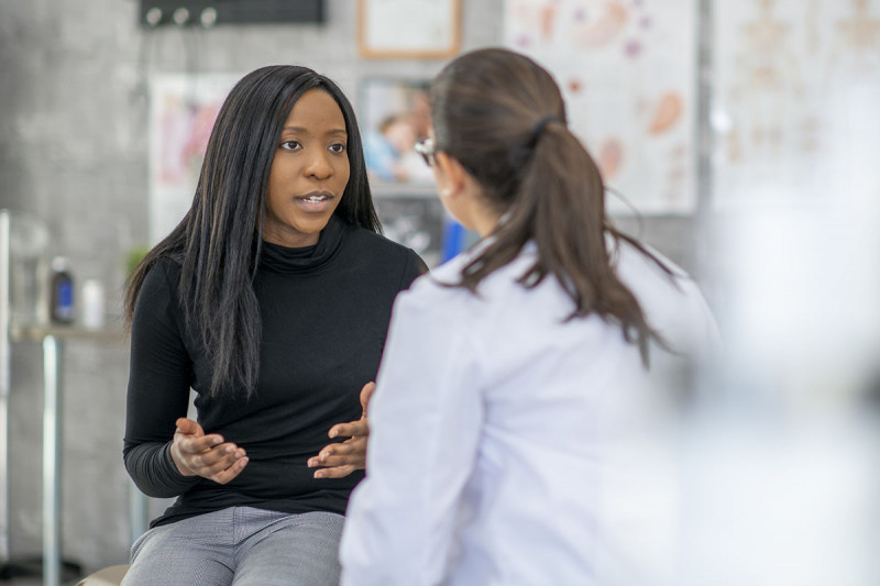 woman talking with her doctor