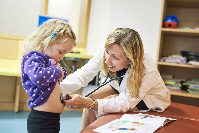 Radiation Oncologist,  Suzanne Wolden with child patient
