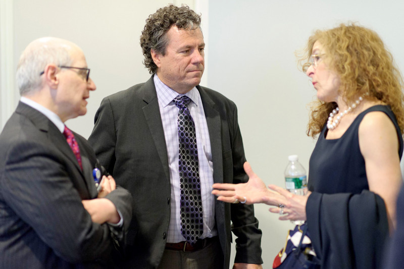 Larry Norton, Deputy Physician-in-Chief for Breast Cancer Programs, and Scott Lowe speak with Mara Hutton, Vice President of the Geoffrey Beene Foundation.