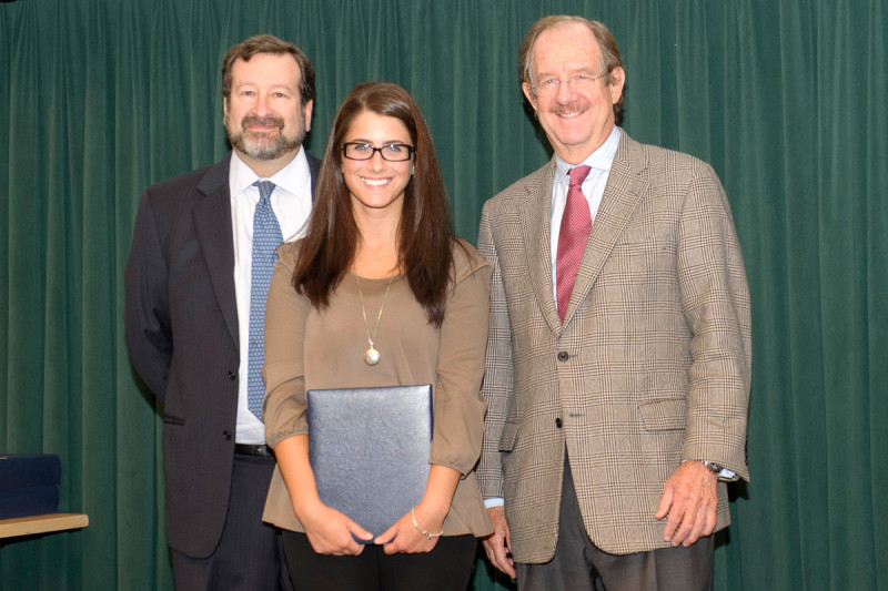 Emily Casey receives the 2012 Geoffrey Beene Graduate Student Fellowship award from Thomas Kelly, alongside her mentor David Scheinberg.