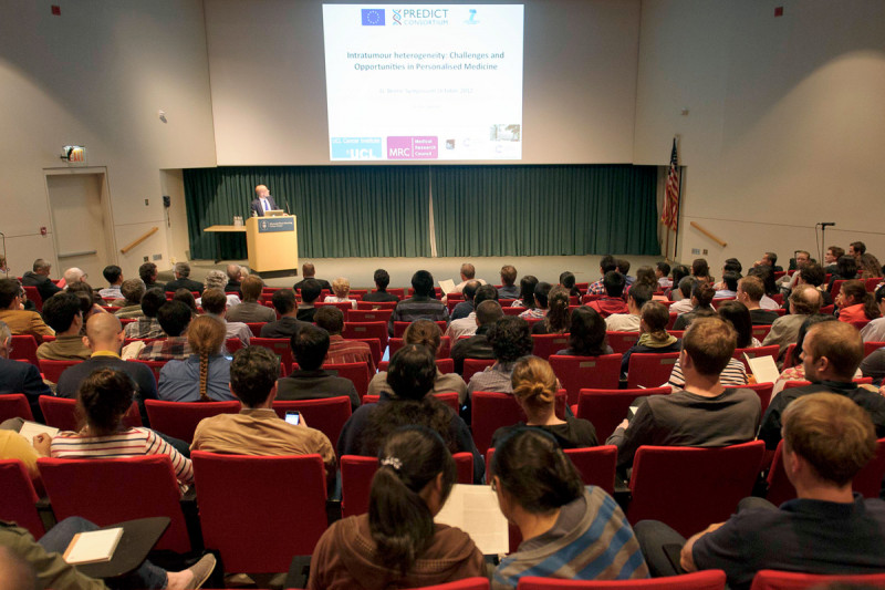 Audience members listen intently to Charles Swanton’s presentation.