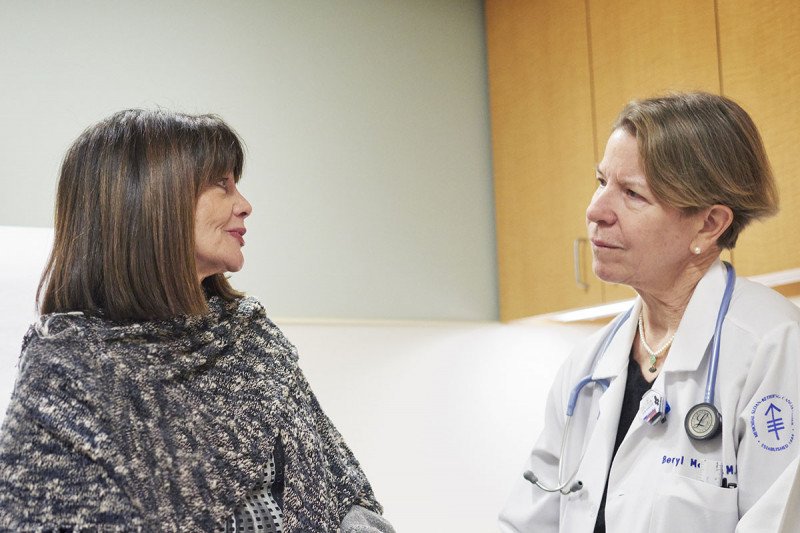 MSK radiation oncologist Beryl McCormick confers with a patient